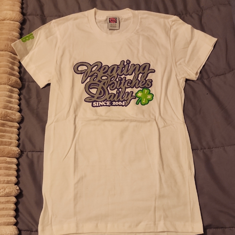 White Graphic T-Shirt‎ with Purple and Green Print